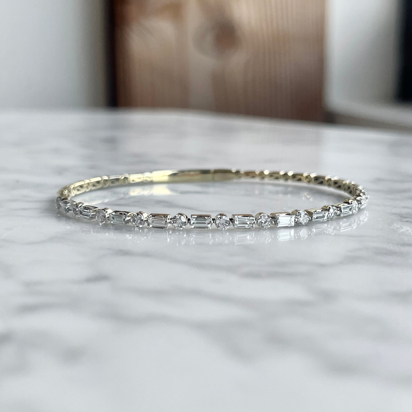 14K Yellow Gold Single Prong Baguette and Round Diamond Flexible Bangle Bracelet