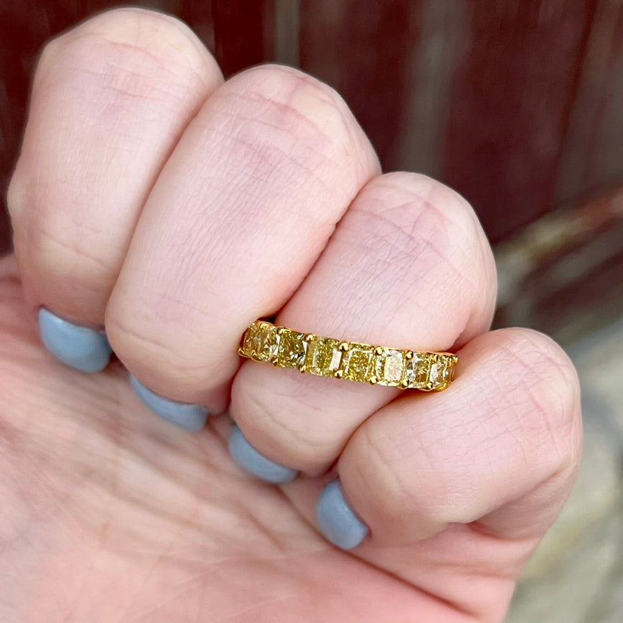 18K Fancy Intense Cushion Cut Yellow Diamond Ring. 2.37CTW