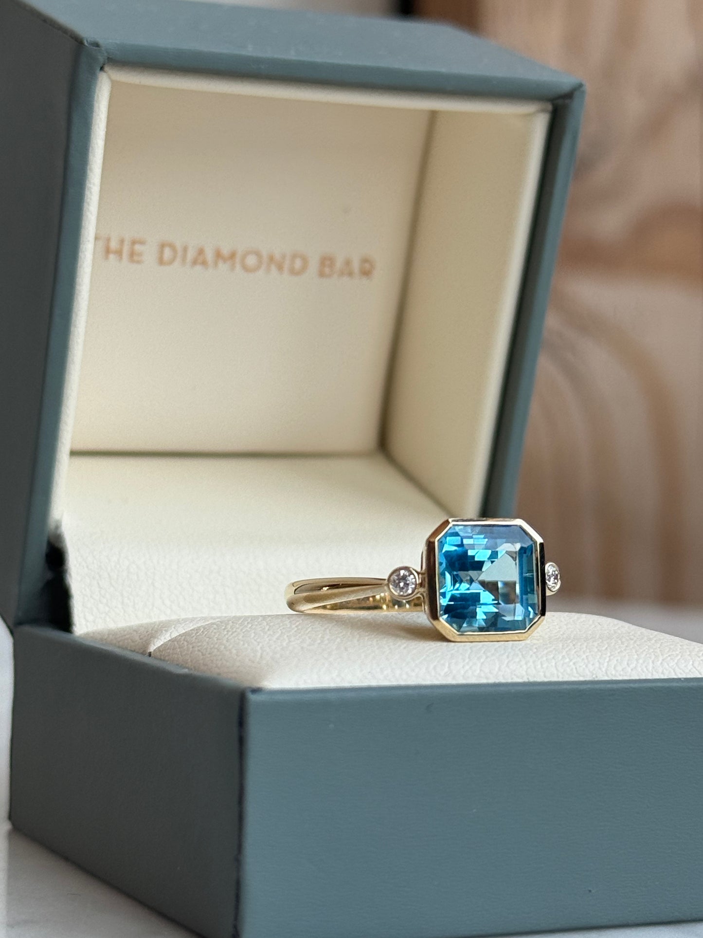 14K Yellow Gold Swiss Blue Topaz and Diamond Ring