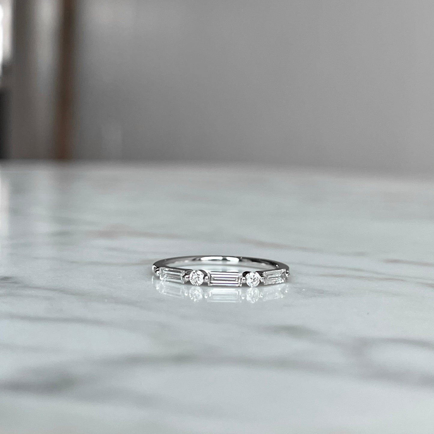 18K White Gold Baguette and Round Single Prong Diamond Band