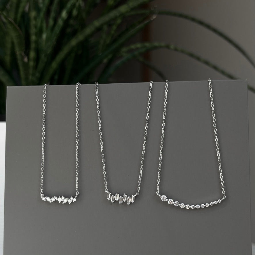 14K White gold Graduating Diamond Single Prong Bar Necklace