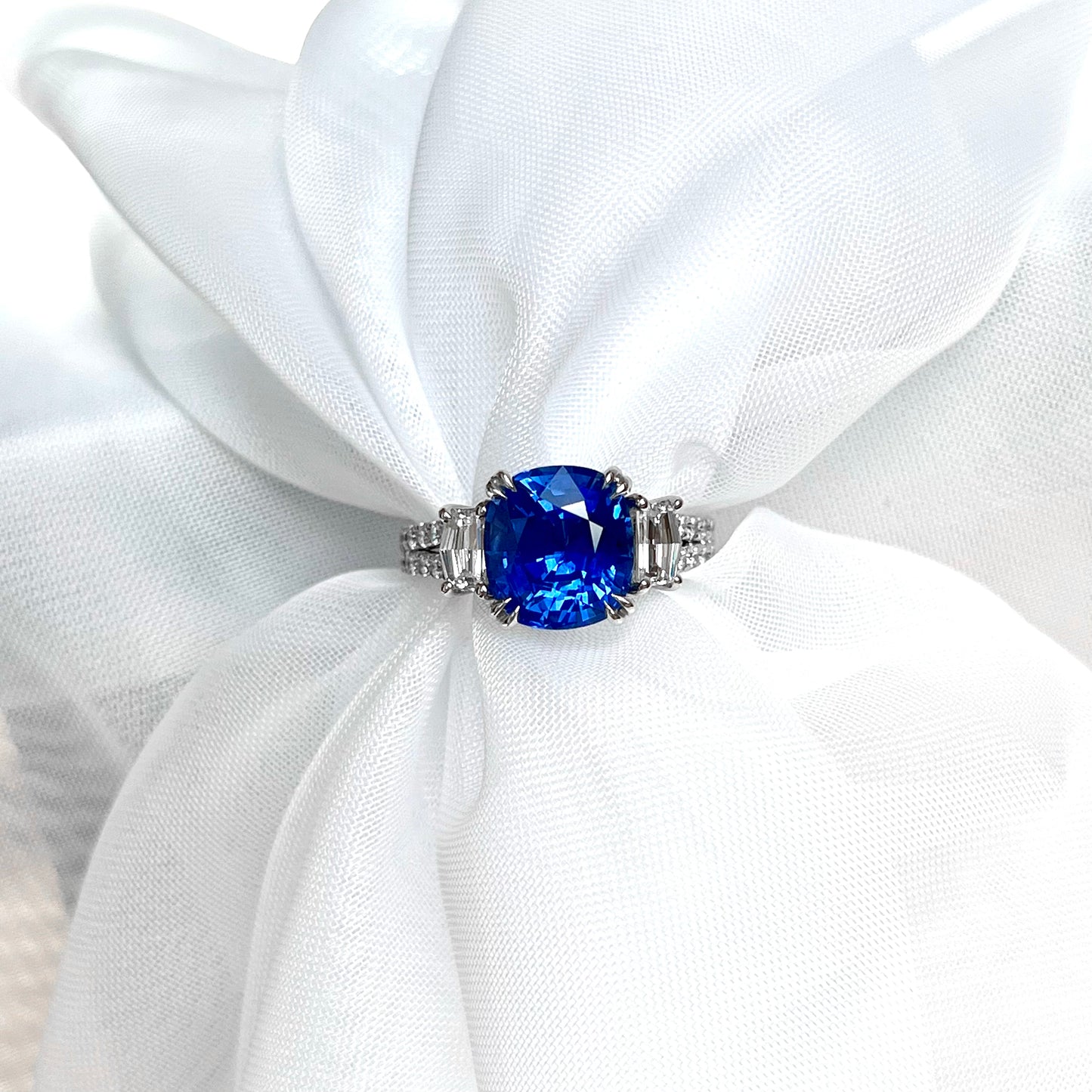 18K White gold Sapphire and Diamond Double Shank Three Stone Ring.