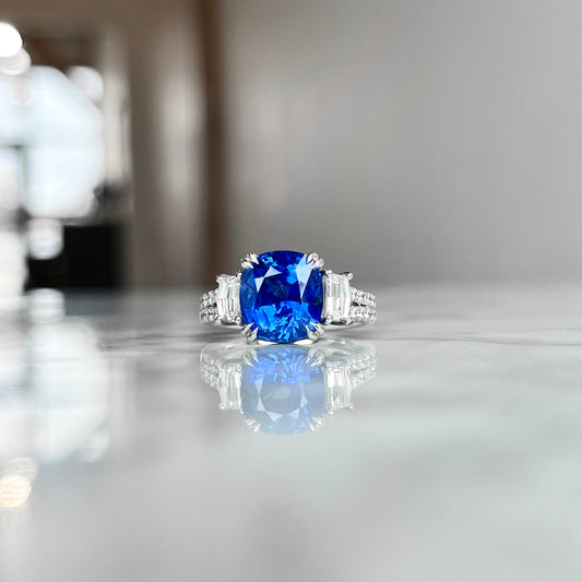 18K White gold Sapphire and Diamond Double Shank Three Stone Ring.