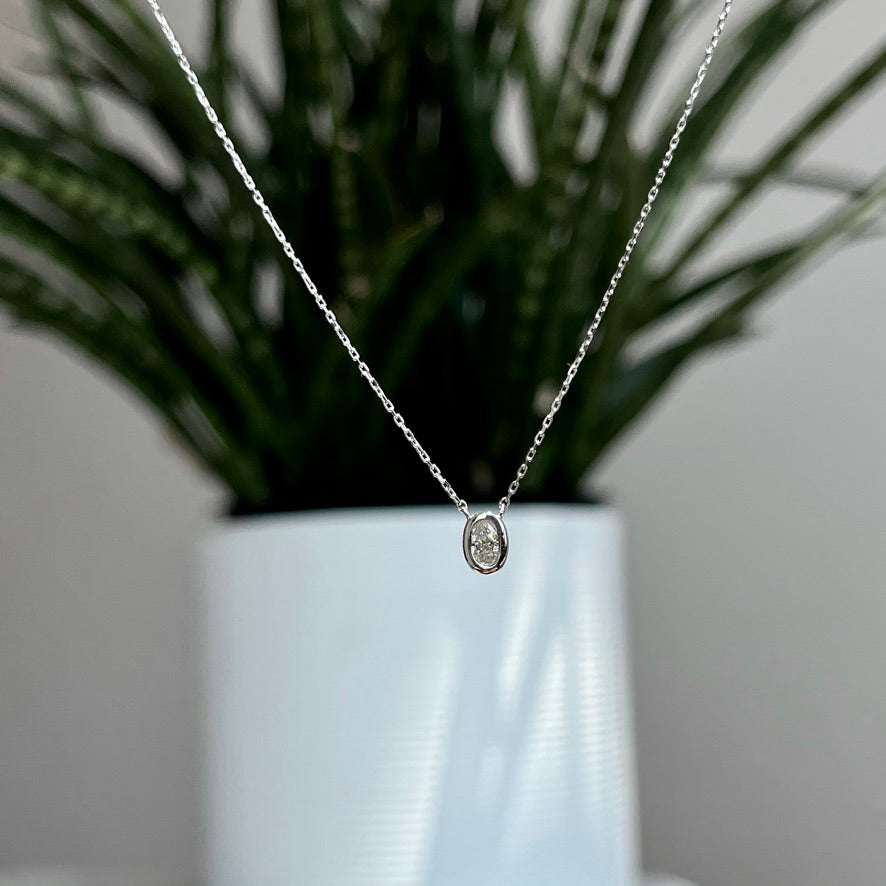 18K White Gold Oval Bezel Solitaire Necklace 18/100CT