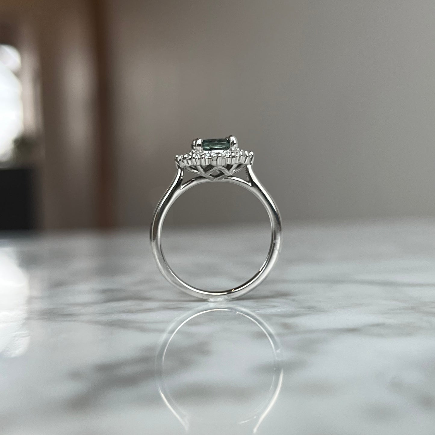 14K White Gold Color Shifting Teal Sapphire and Diamond Halo Ring