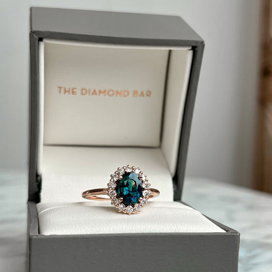 14K Rose Gold Natural Teal Sapphire and Diamond Halo Ring.