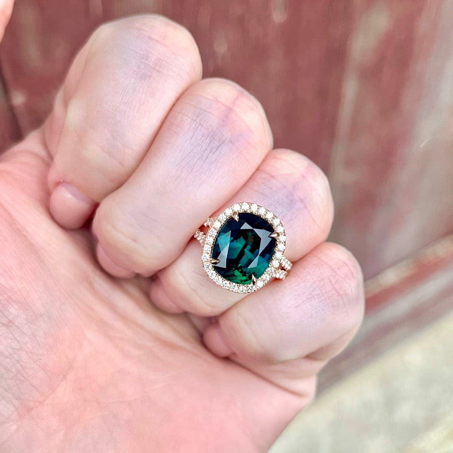 14K Rose Gold No-Heat Teal Sapphire and Diamond Halo Ring.