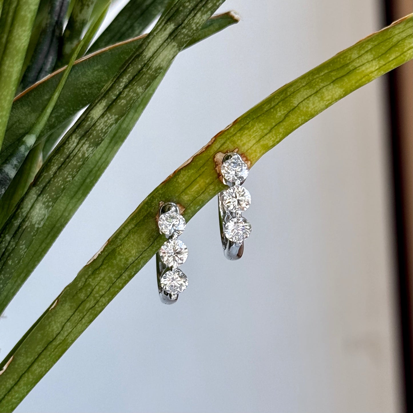14K White Gold Single Prong Diamond Huggie Earrings