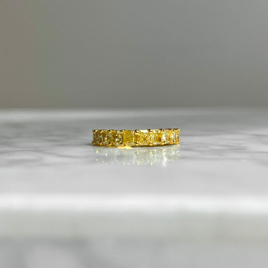 18K Fancy Intense Cushion Cut Yellow Diamond Ring. 2.37CTW