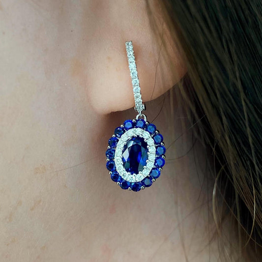 One pair (2) 14K white gold sapphire and diamond double halo earrings 2.25CTW