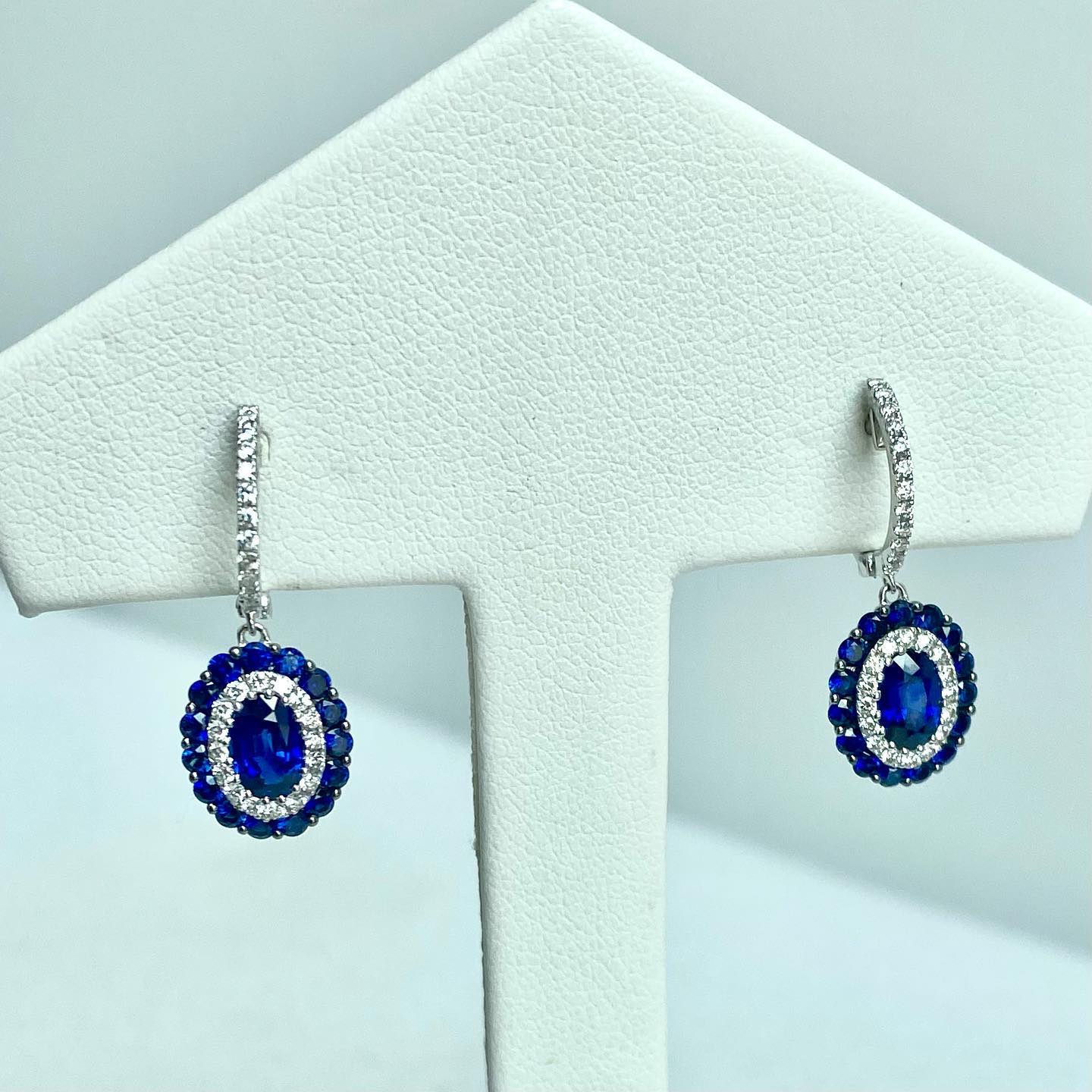 One pair (2) 14K white gold sapphire and diamond double halo earrings 2.25CTW