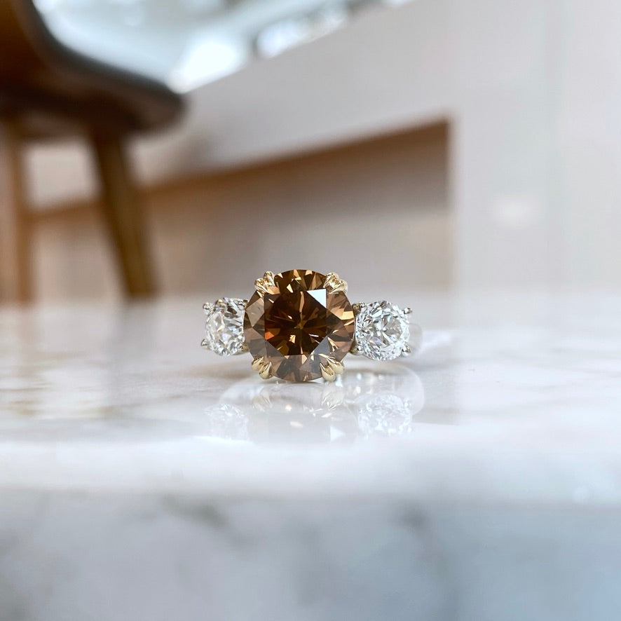 Platinum and 18K Yellow Gold Chocolate Diamond and Old European Cut Diamond Three Stone Ring