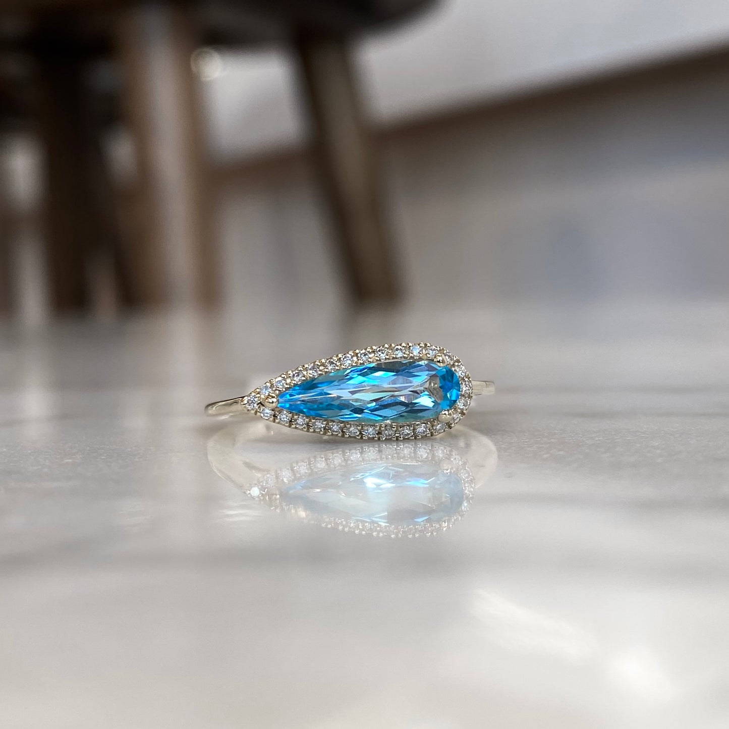 14K Yellow Gold Elongated Pear Blue Topaz and Diamond Ring