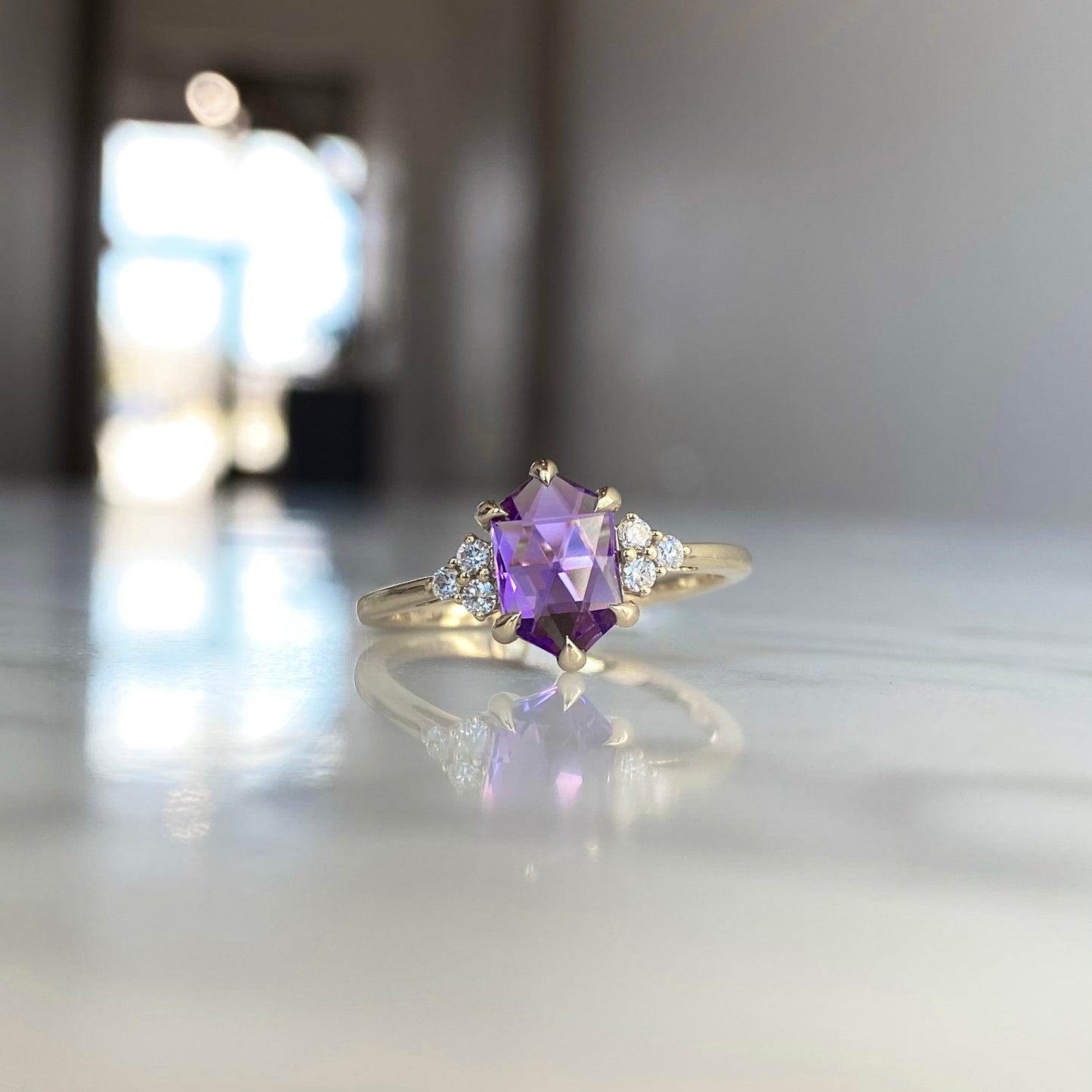 14K yellow gold elongted hexagon cut amethyst and diamond ring