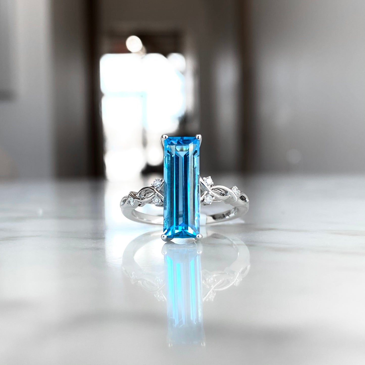 14K White Gold Long Blue Topaz Semi Baguette Ring