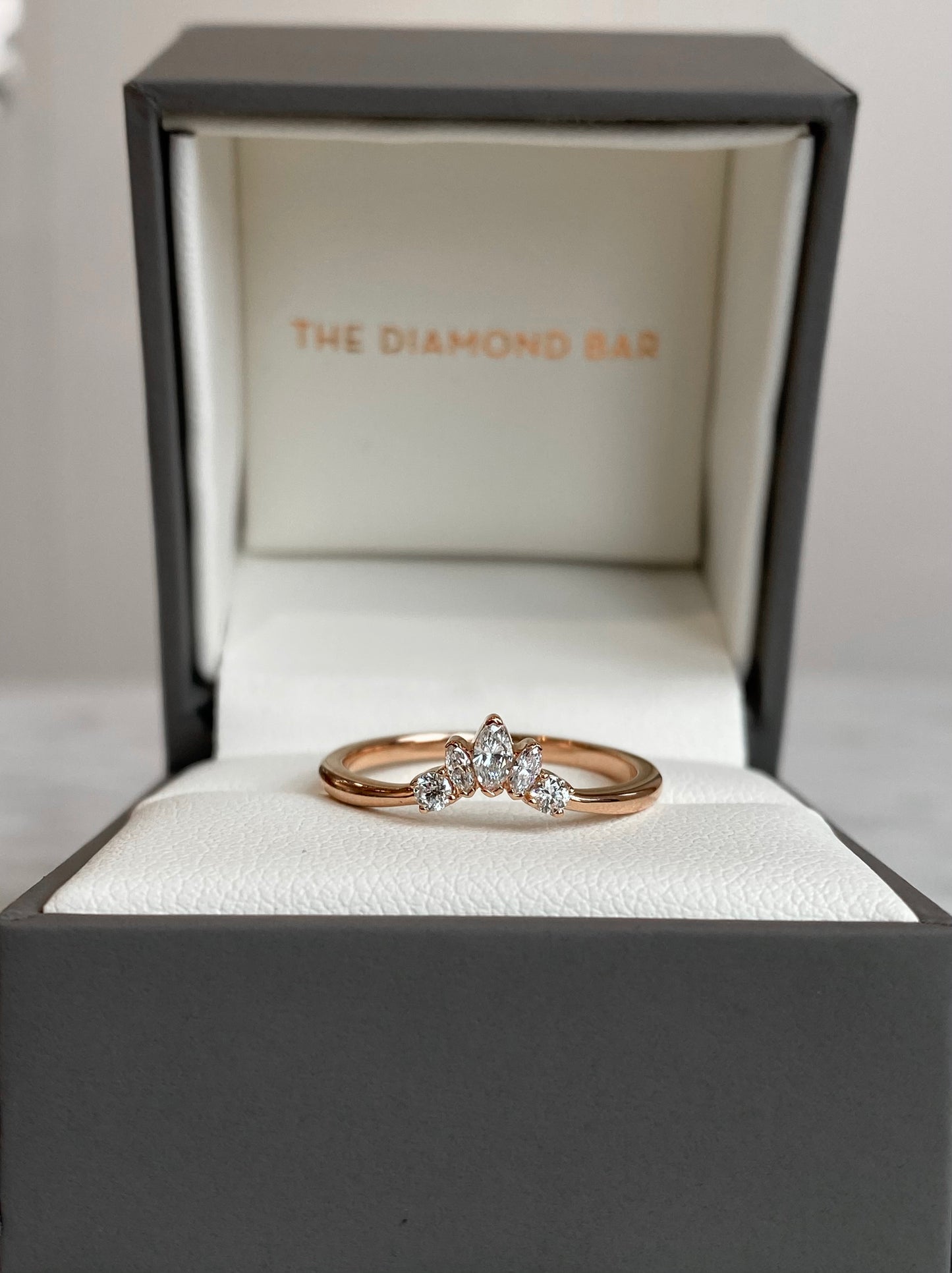 14K marquise and round diamond contour band 1/5CTW