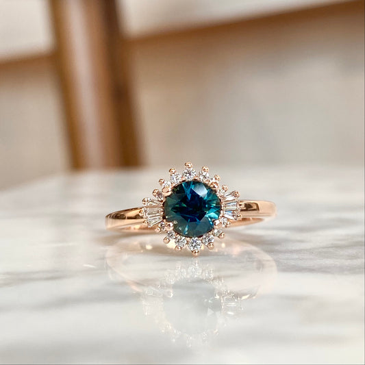 14K rose gold teal color-shifting sapphire and diamond halo ring 1.23CTW