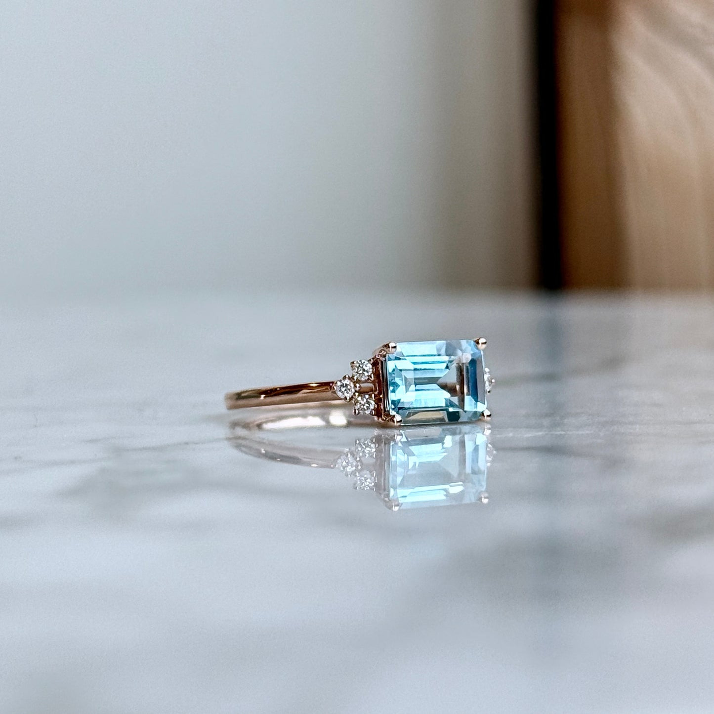 14K Rose Gold Sky Blue Topaz and Diamond Ring