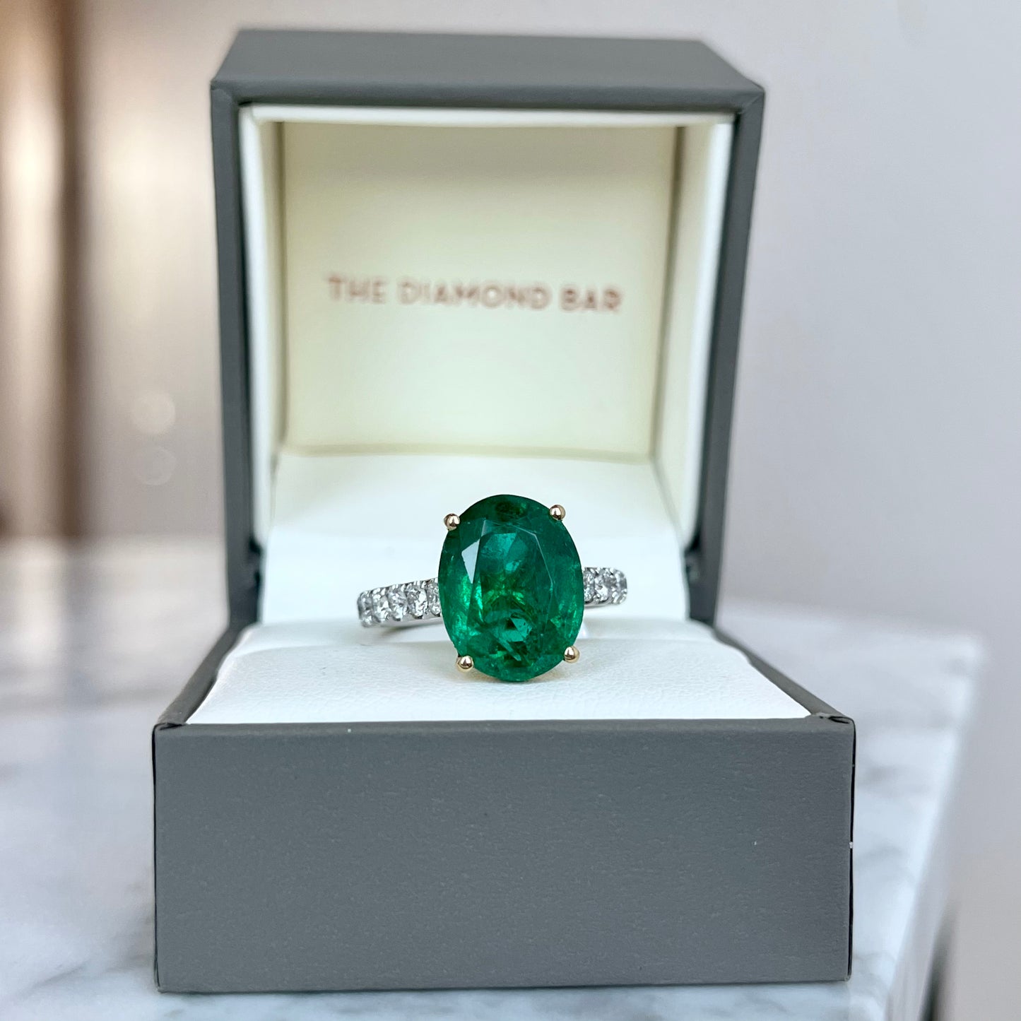 18K White and Yellow Gold Emerald and Diamond Ring.