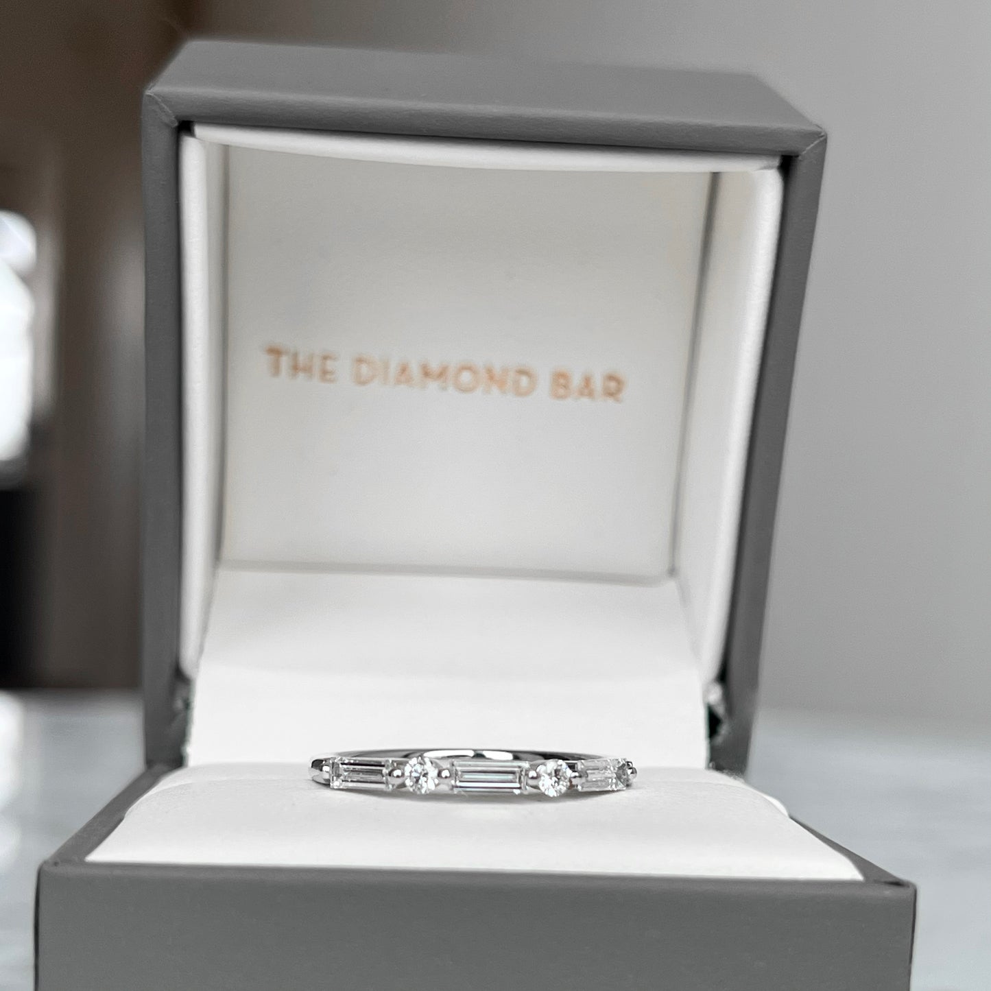 18K White Gold Baguette and Round Single Prong Diamond Band