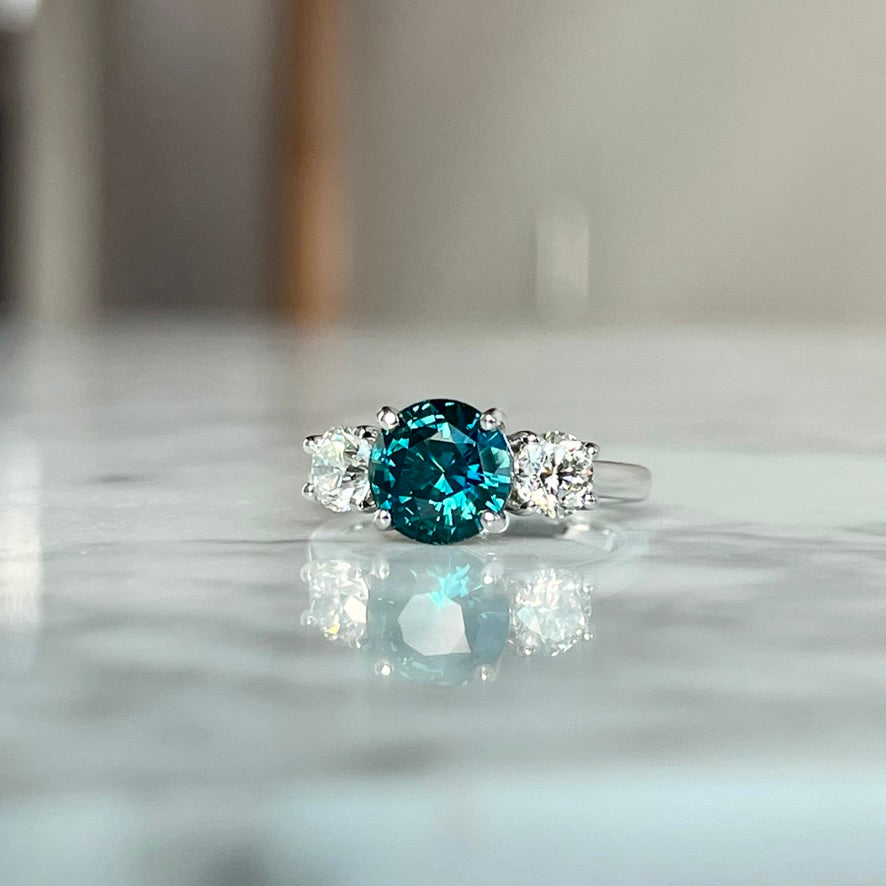 14K White Gold Teal Sapphire and Diamond Three Stone Ring