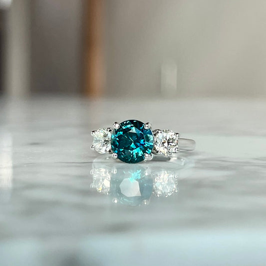 14K White Gold Teal Sapphire and Diamond Three Stone Ring