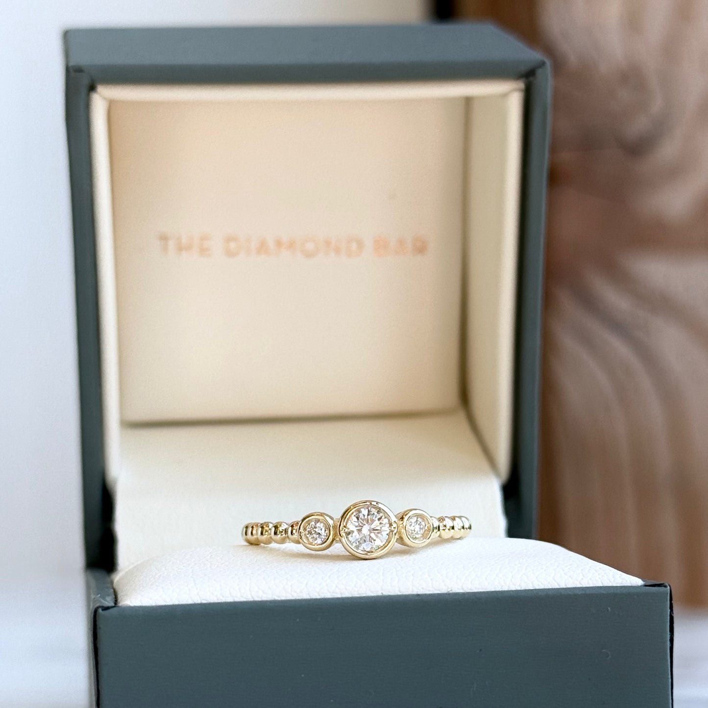 14K Yellow Gold Three Stone Bezel Ring