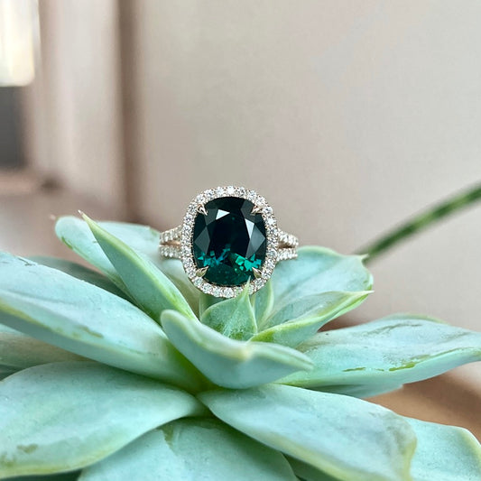 14K Rose Gold No-Heat Teal Sapphire and Diamond Halo Ring.