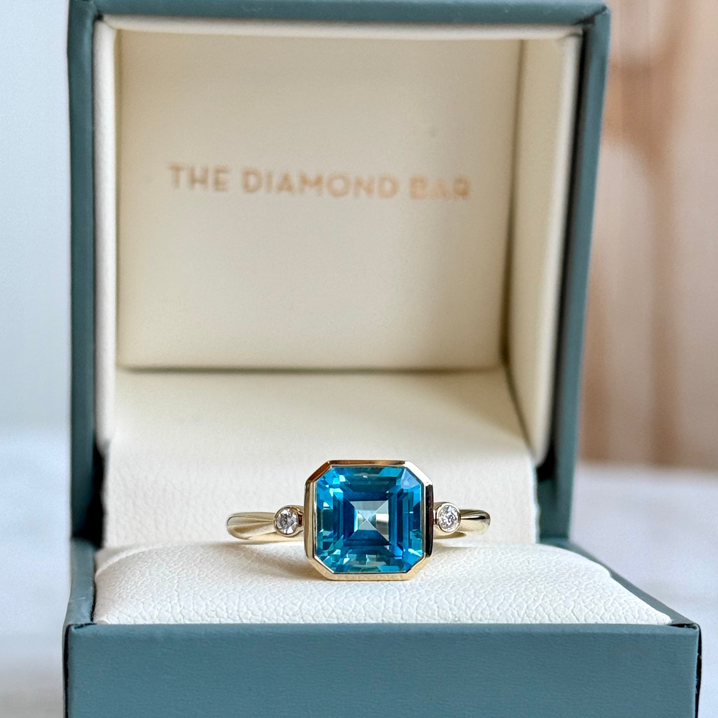 14K Yellow Gold Swiss Blue Topaz and Diamond Ring