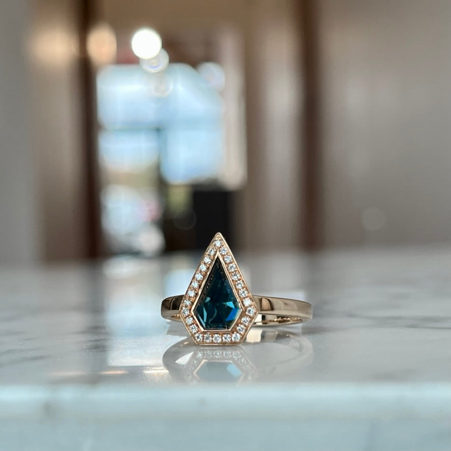 14K Rose Gold Blue Topaz and Diamond Halo Ring