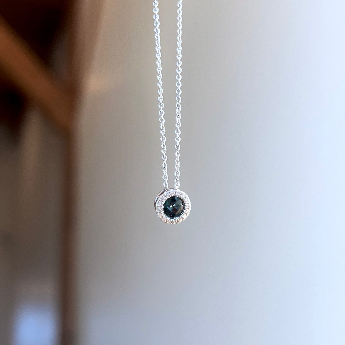 Dainty 18K White Gold Teal Sapphire and Diamond Halo Necklace