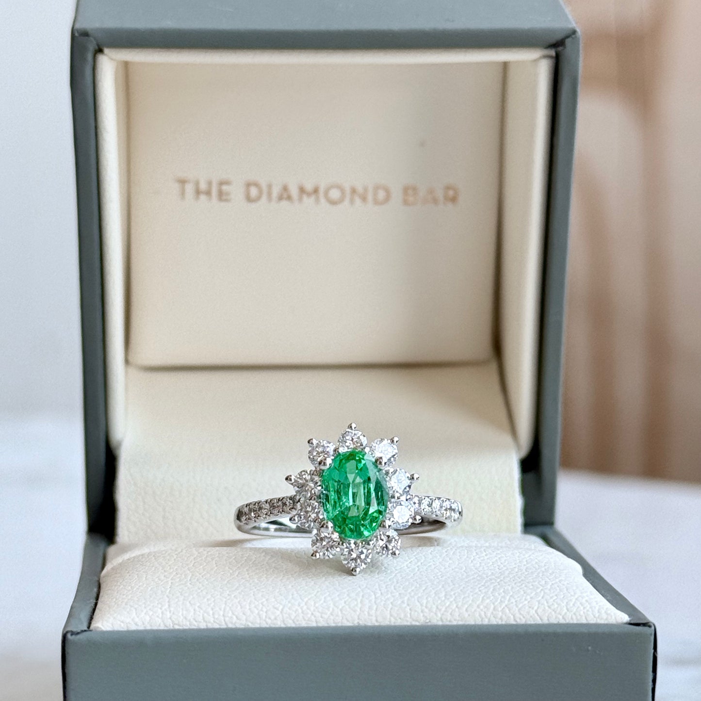 18K White Gold Emerald and Diamond Halo Ring