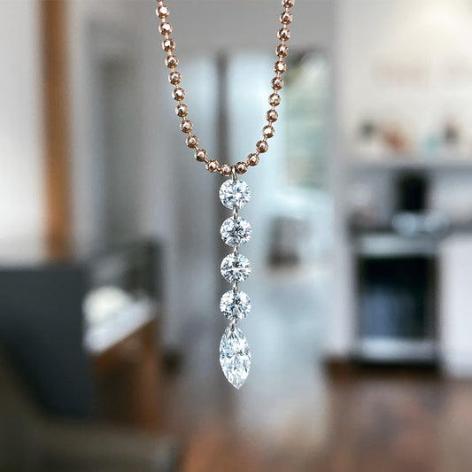 14KR Round and Marquise Cut Floating Diamond Drop Pendant