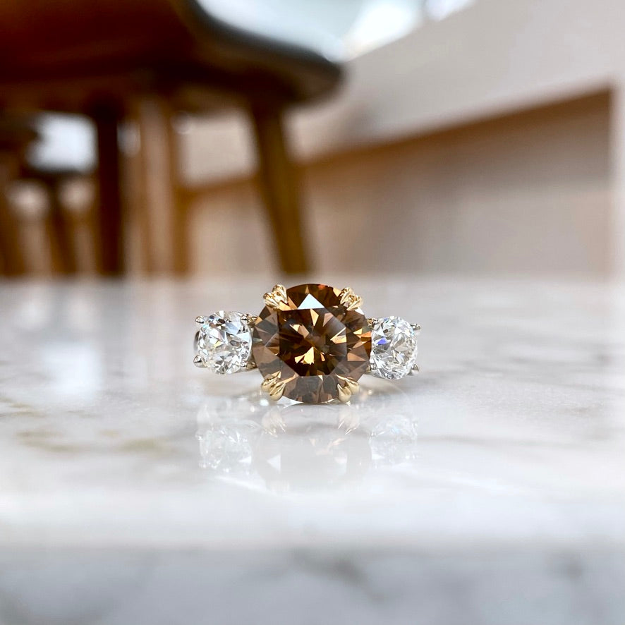 Platinum and 18K Yellow Gold Chocolate Diamond and Old European Cut Diamond Three Stone Ring