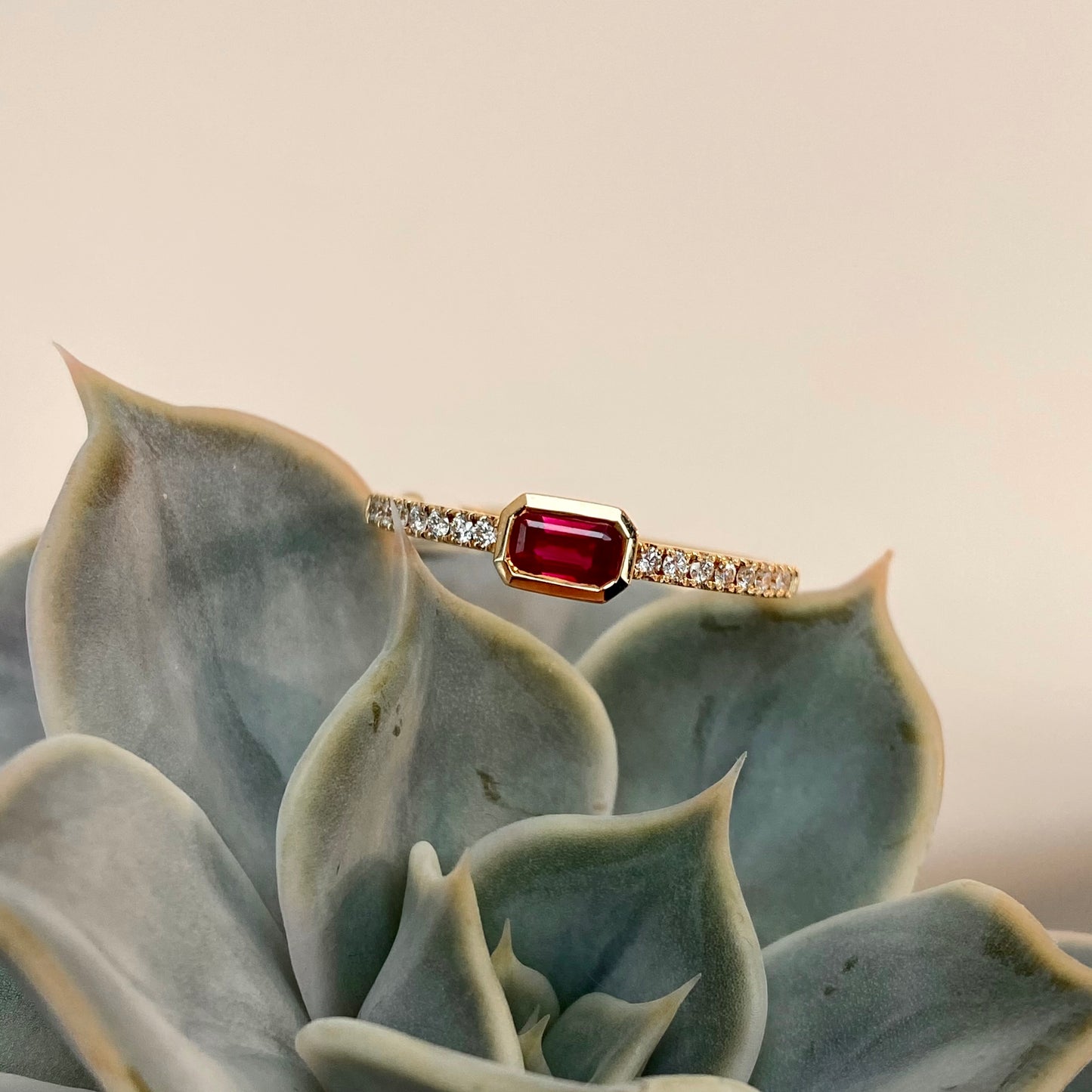 14K Emerald Cut Ruby East/West Bezel Set With Diamond Shank