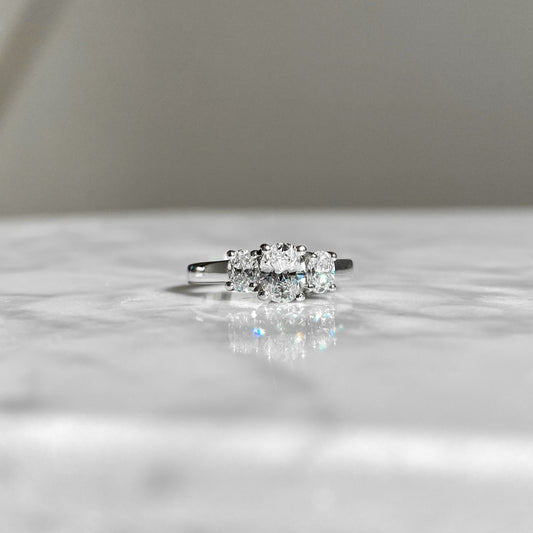 Platinum three stone oval engagement ring 1.10CTW